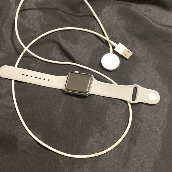 Apple Watch (Series 3) 2017 38 mm - Stainless steel with grey rubber sport band